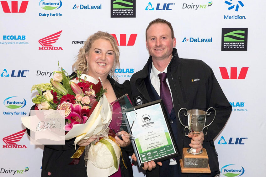 Ann and Scott Henderson with their sharemilker award. Photo: Chris McCullough