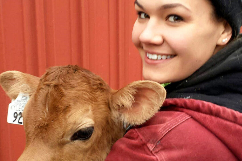 Anna  grew up feeding calves on the farm.