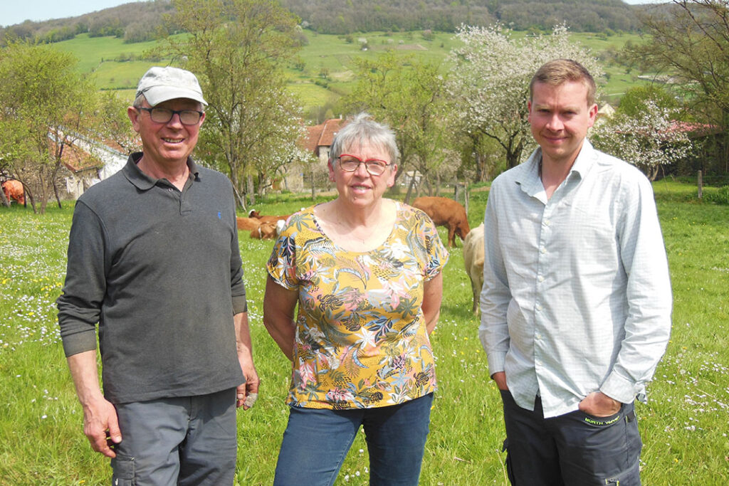 Simon Belin with his parents Brigitte and Yves in the young heifers’s meadow. Photo: Philippe Caldier