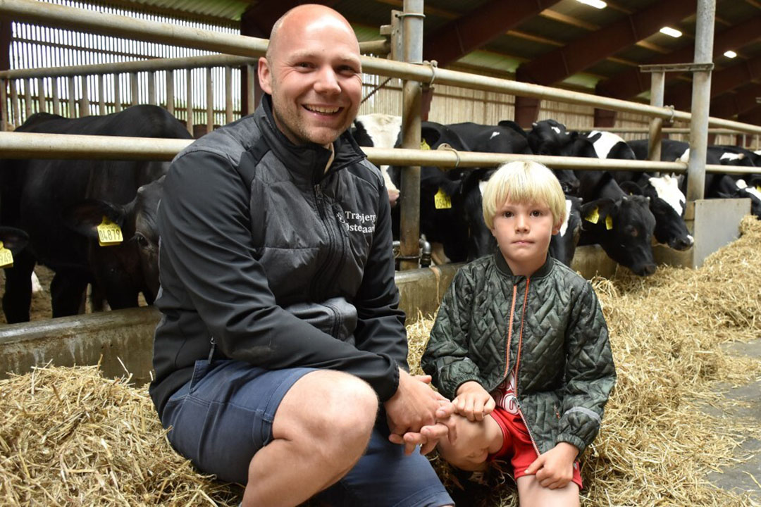 Kristian Sorensen with his son Herman (6) on their Tranbjerg Ostergaard farm. Photo: Chris McCullough