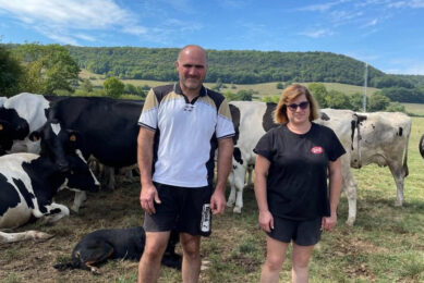 Nathalie and Jean-Louis Mairet among grazing cows. Photo: Gaec Mairet family