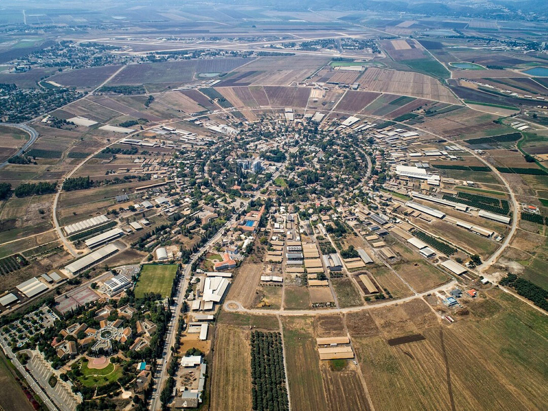 A typical kibbutz is a community in Israel usually centred around a dairy farm.