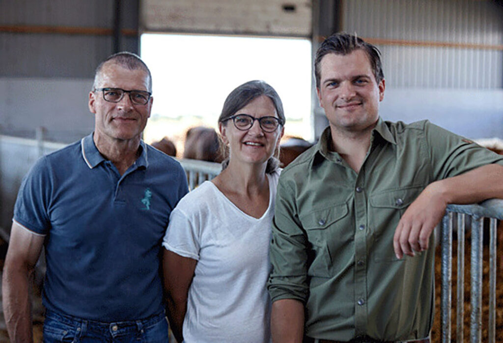 Charlotte and Henning with their son Andreas together run the organic dairy farm in Denmark.