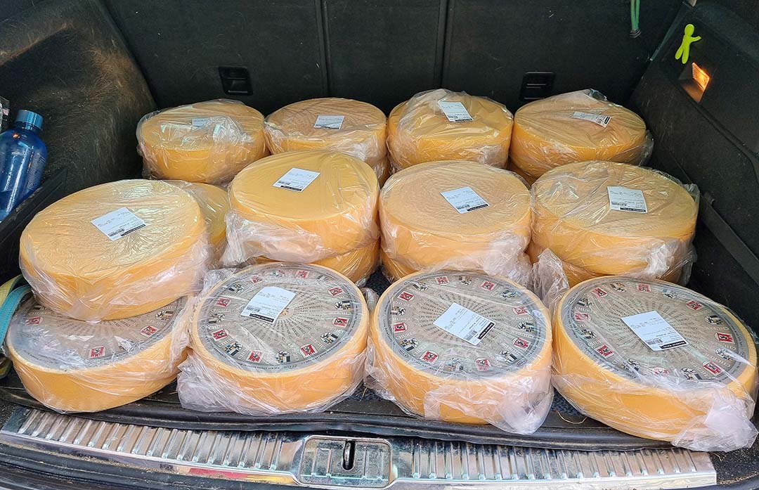 Cheese wheels made on the summer grazing Alpine farm are sold as extra income.